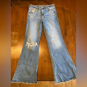American Eagle Jeans, worn once, one hole in knee, size 8